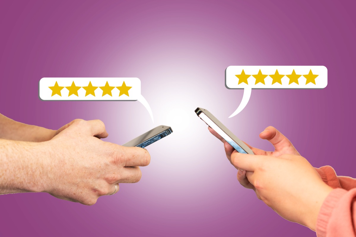 Two hands holding smartphones facing each other, each with a speech bubble showing a five star rating in gold stars, against a purple background.
